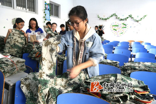 天行平台_天行(中国):2000套军训服有了新主人